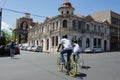 Couple cycling through the Maboneng precinct of Johannesburg