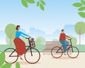 Couple of cyclists in the park as rides a bike concept, Flat vector stock illustration of cycling in the park among the leaves Royalty Free Stock Photo