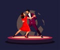 Couple dance tango on stage in spotlight, man and woman in red dress dancing together Royalty Free Stock Photo