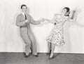 Couple dancing the jitterbug Royalty Free Stock Photo