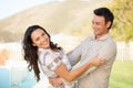 Couple, dancing and outdoor with happiness, love and honeymoon for fun, romantic and smile. Relationship, bonding