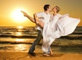 Couple dancing tango on the beach Royalty Free Stock Photo