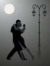 Couple dancing tango under the moon.