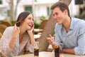 Couple dating and flirting in a restaurant Royalty Free Stock Photo