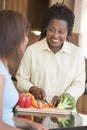 Couple With Daughter Preparing Meal Royalty Free Stock Photo