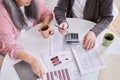 Couple discussing finances while sitting at home