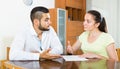 Couple with documents in apartment Royalty Free Stock Photo