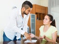 Couple with documents in apartment Royalty Free Stock Photo