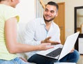 Couple with documents and notebook Royalty Free Stock Photo