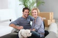 Couple and dog move into home Royalty Free Stock Photo