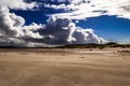 Couple With Dog Taking A Walk On The Sandy Achnahaird Beach In Scotland Royalty Free Stock Photo