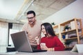 Couple doing business together working at small office on the laptop Royalty Free Stock Photo