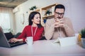 Couple doing business together working at small office on the laptop Royalty Free Stock Photo