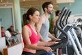 Couple doing cardio training in a fitness center