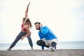 Couple doing fitness on the beach Royalty Free Stock Photo