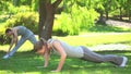 Couple doing musculation exercises