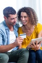 Couple doing online shopping on digital tablet Royalty Free Stock Photo