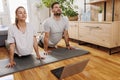Couple doing online yoga training course Royalty Free Stock Photo