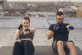 Couple doing punch crunches exercise