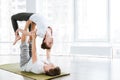 Couple doing stretching exercises in yoga studio Royalty Free Stock Photo