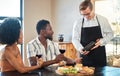 Couple doing wine tasting at a vineyard, eating food on romantic vacation and drinking alcohol at farm together. Happy Royalty Free Stock Photo