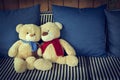 Couple doll bear lover decorated on sofa furniture interior Royalty Free Stock Photo