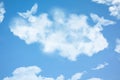 Couple of dove birds in cloud shape soars in blue sky. Concept of love, romance and happy relations. Valentine day or wedding Royalty Free Stock Photo