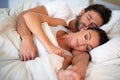 Couple, dreaming and rest in bedroom of home, peace and man together with woman in bed. Marriage, love and partners Royalty Free Stock Photo