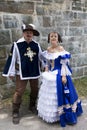 Couple dressed up as a 17th century French musketeer and noble lady during the New France Festival Royalty Free Stock Photo