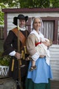 Couple dressed up as a 17th century soldier and his King`s Daughter wife and baby during the New France Festival