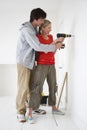 Couple Drilling Inside Their New Home