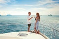 Couple drinking champagne on luxury yacht, sea holidays Royalty Free Stock Photo