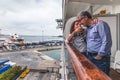 Couple drinking a drink on the deck of a cruise ship Royalty Free Stock Photo