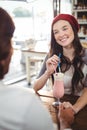 Couple drinking milkshake with a straw Royalty Free Stock Photo