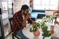 Couple drinking a morning coffee together. Man talks with her wife - lifestyle and communication family concept