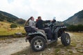 Couple drive atv quad bike Royalty Free Stock Photo