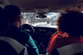 A couple drives in the fancy car at winter snowy day Royalty Free Stock Photo