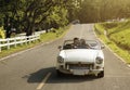 Couple Driving a Car Traveling on Road Trip Together