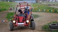 Couple driving Dune Buggy Royalty Free Stock Photo