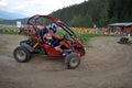 Couple driving Dune Buggy Royalty Free Stock Photo