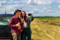 Travel, love, date and people concept - happy couple hugging relaxing on the road. Royalty Free Stock Photo