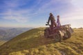 Couple driving off-road with quad bike or ATV Royalty Free Stock Photo