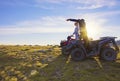 Couple driving off-road with quad bike or ATV Royalty Free Stock Photo