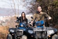 Couple Driving Off-road With Quad Bike or Atv Royalty Free Stock Photo