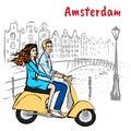 Couple driving scooter in Amsterdam