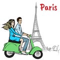 Couple driving scooter in Paris