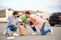 Couple dropped the package on supermarket parking