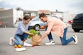 Couple dropped the package on supermarket parking