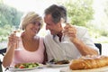 Couple Eating An Al Fresco Meal Royalty Free Stock Photo