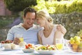 Couple Eating An Al Fresco Meal Royalty Free Stock Photo